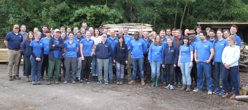 MapAction team photo taken outdoors in rural environment