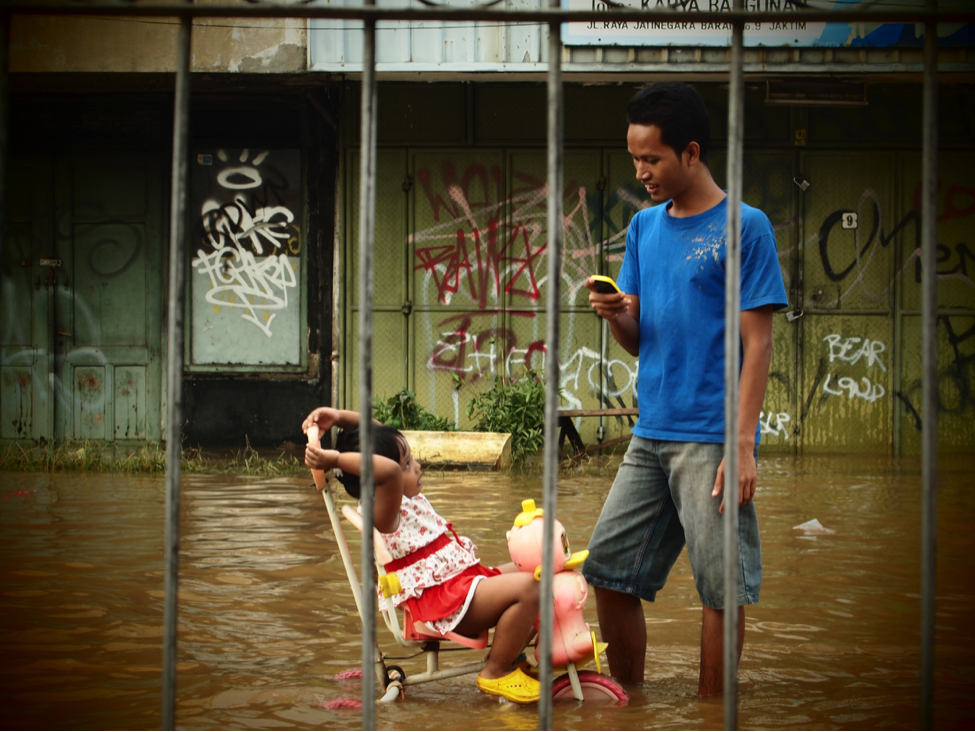 Jakarta has one of the highest number of Twitter users in the world, PetaJakarta.org is harnessing this communication system to collect and disseminate information about flooding in near-real time. Photo courtesy of Ariel Shepherd.