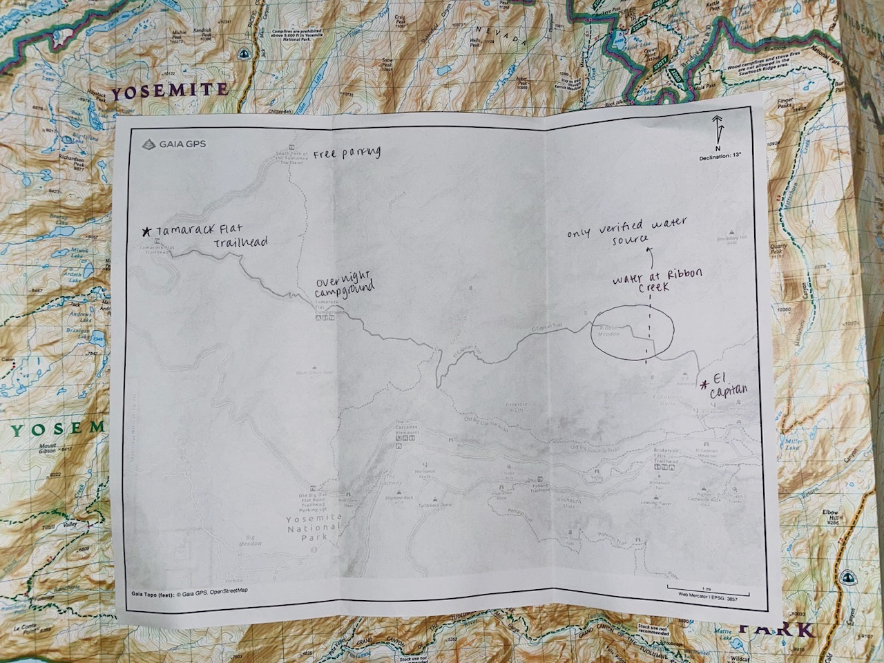 Annotated paper map on top of National Geographic map